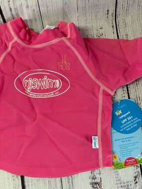 i play. Pink Kids Swim Rashguard NEVER USED